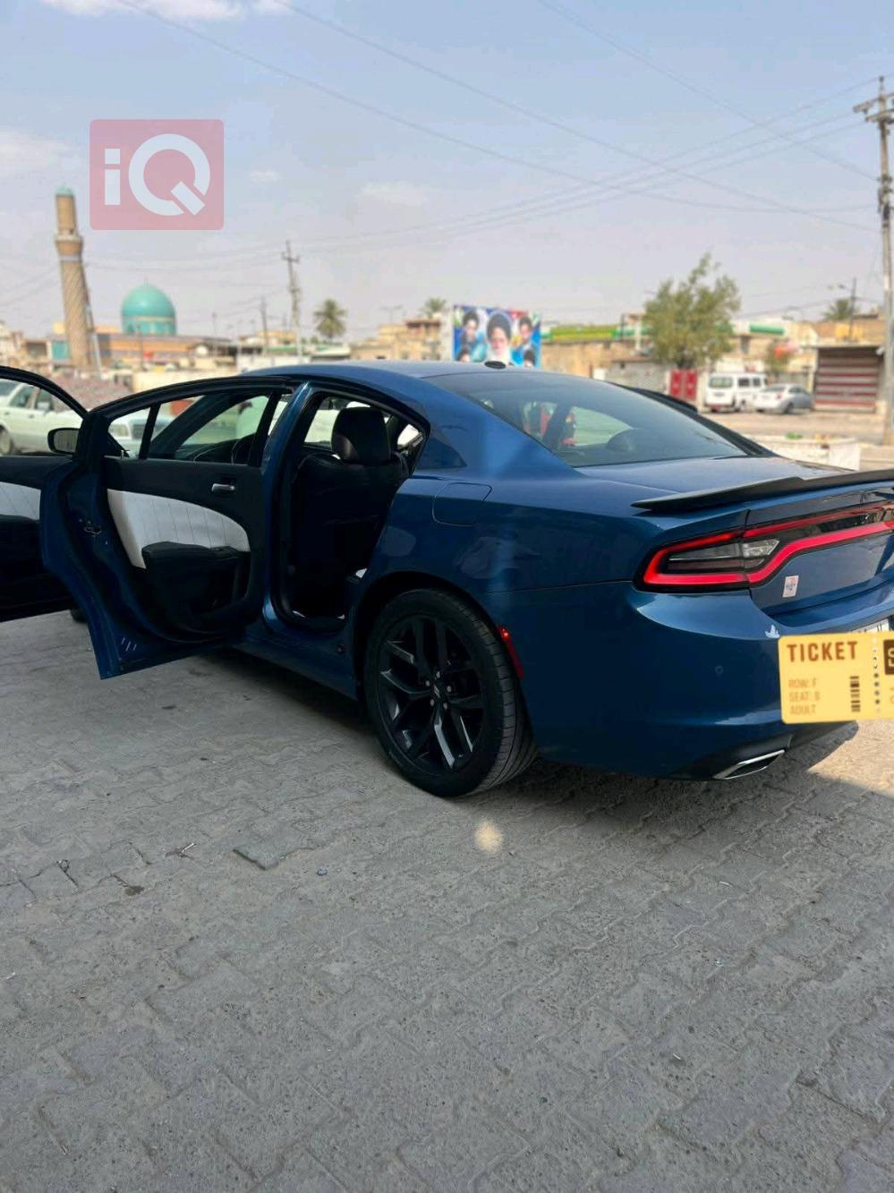 دۆج چارجەر